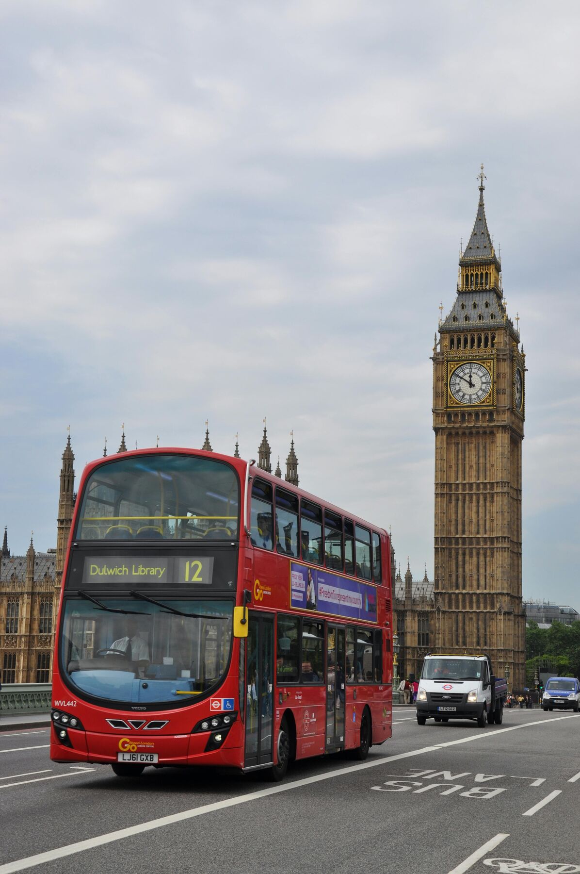 Red London bus at Houses of Parliament